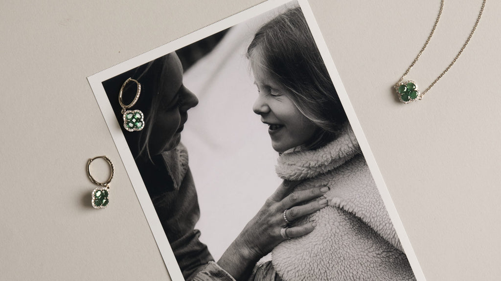 clover set over a photo of mother and daugther