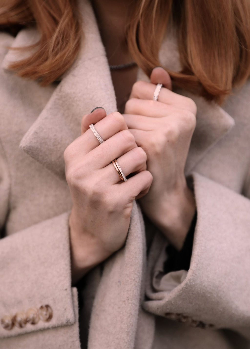 A lady wearing eternity rings