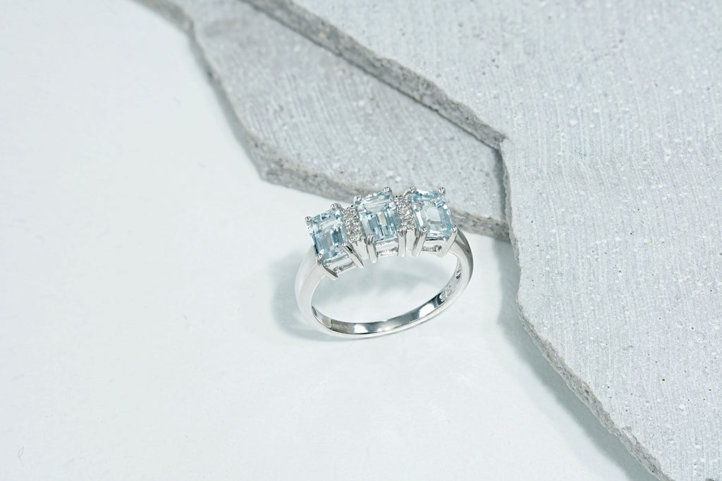 three stone aquamarine ring