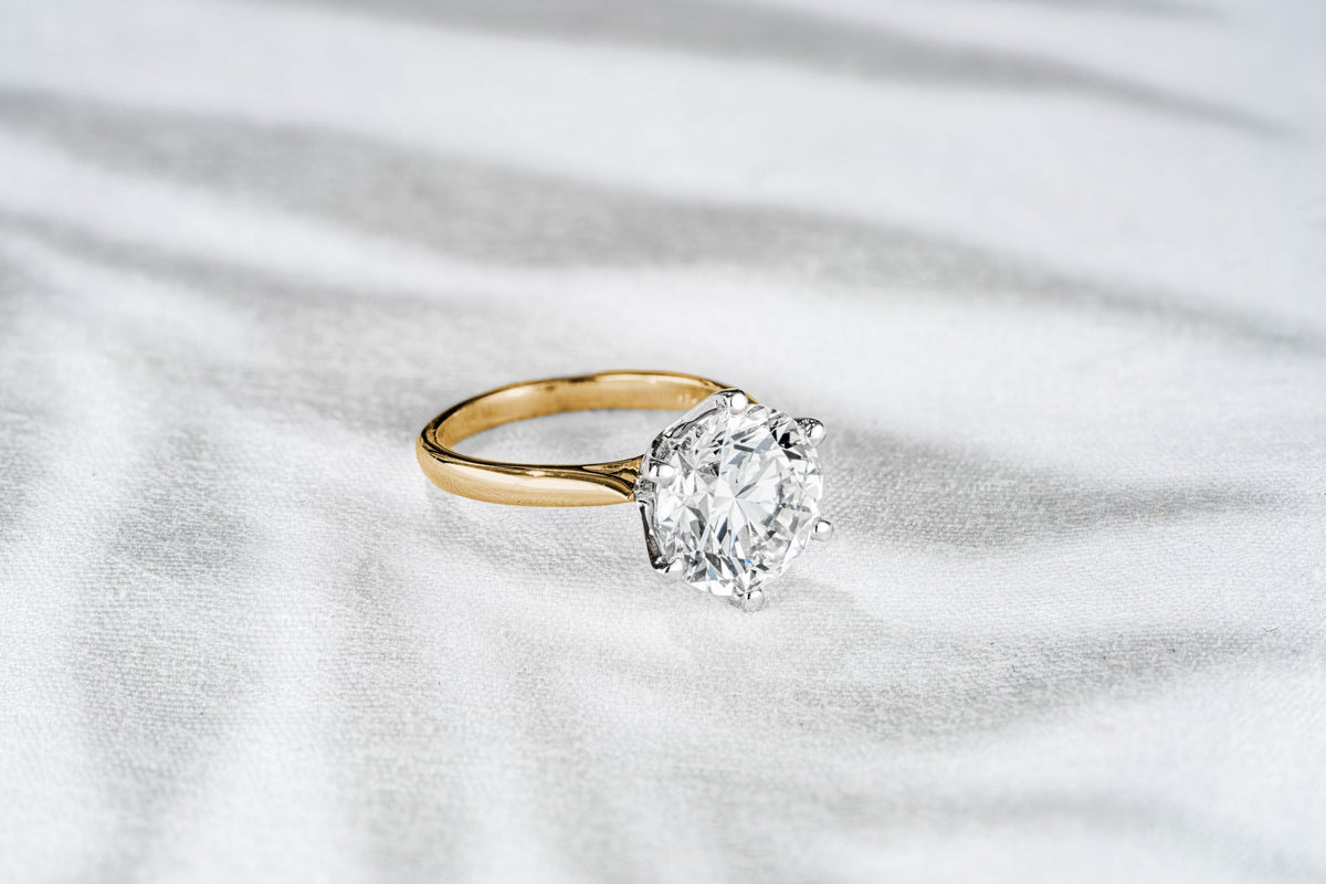 yellow gold diamond solitaire ring