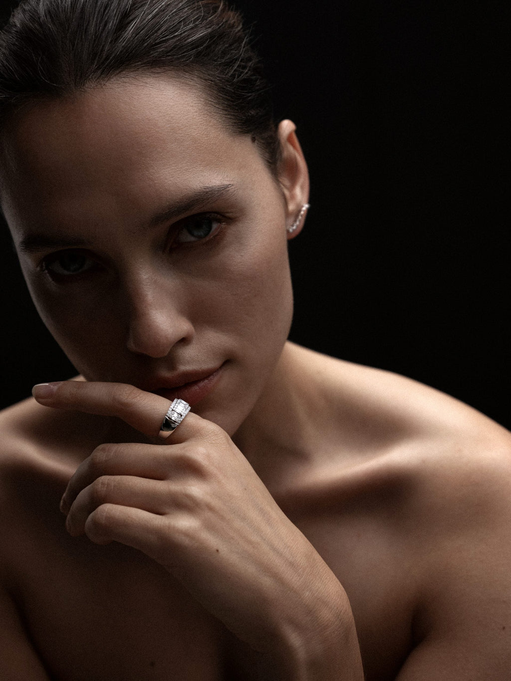 woman with baguette cut diamond ring