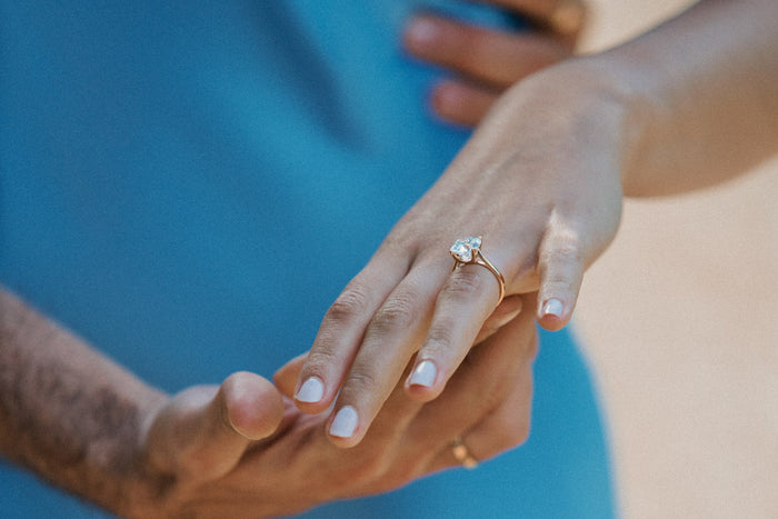 woman showing engagement ring