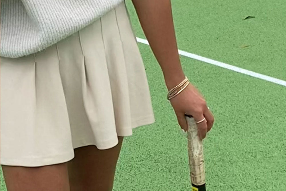 tennis player wearing tennis bracelet