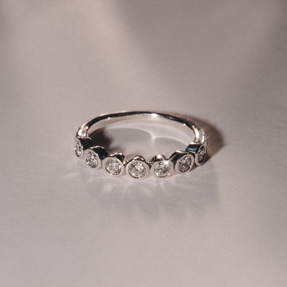 Orbit Half Band 0.15ct G/VS Round Cut Rubover Eternity Ring in Sterling Silver