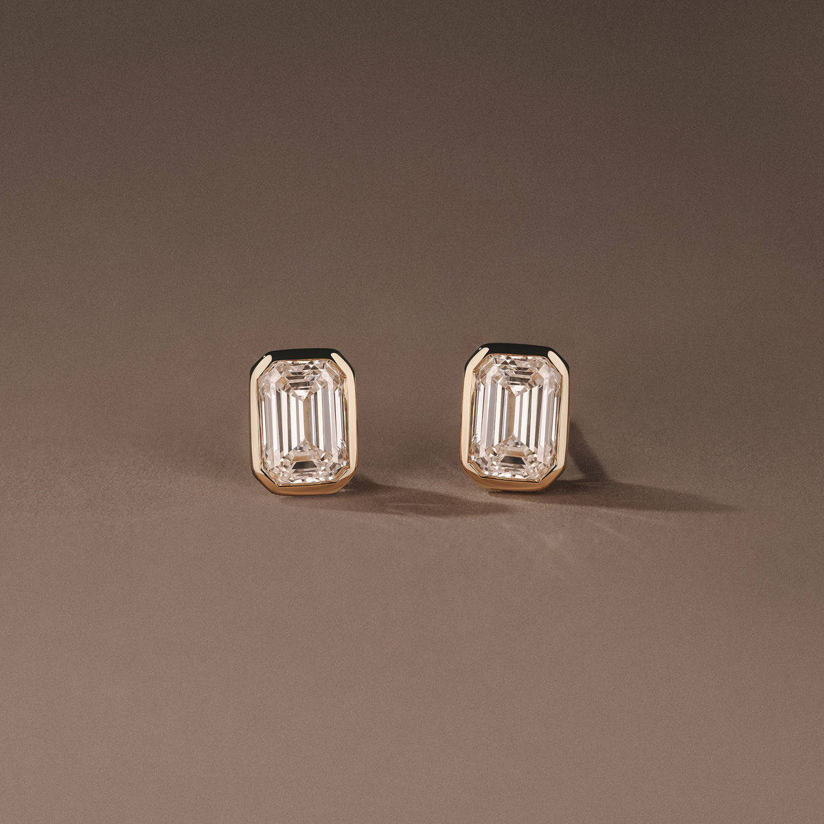 Bezel Set 2.00ct Emerald Cut Lab Diamond Stud Earrings in 18K Yellow Gold