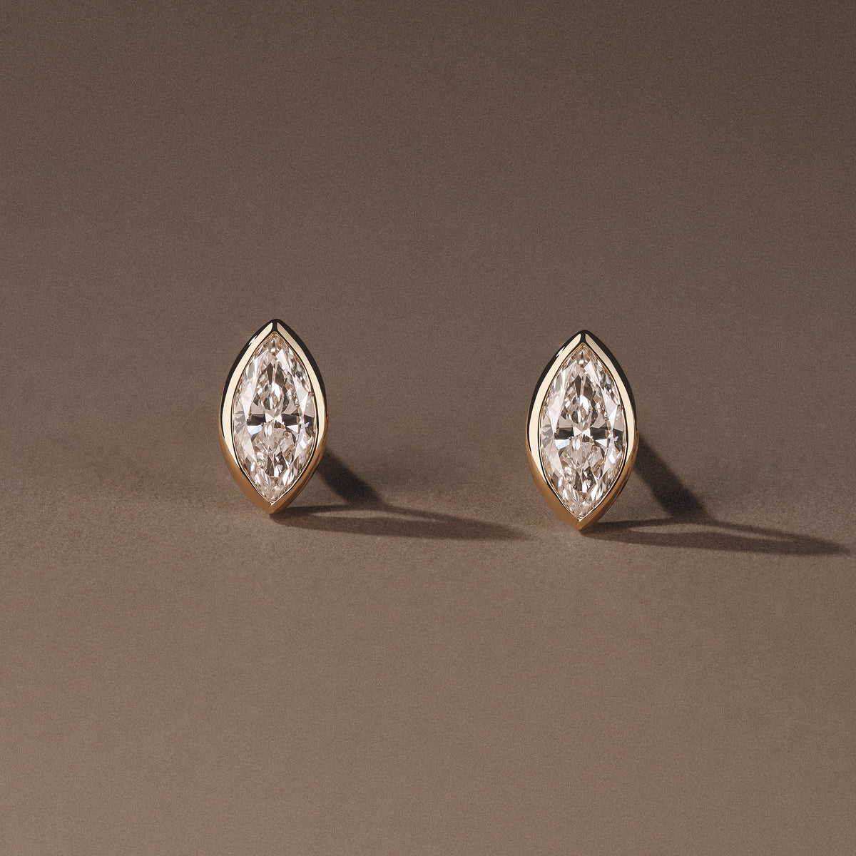 Bezel Set 0.50ct Marquise Cut Lab Diamond Stud Earrings in 18K Yellow Gold
