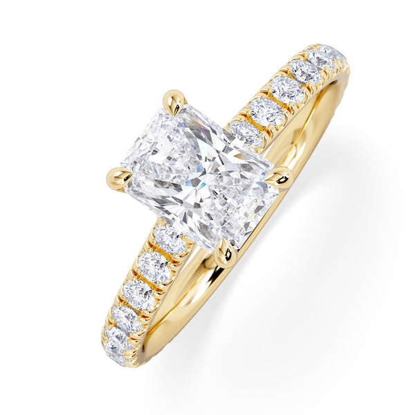 Amora Radiant 1.00ct Hidden Halo Diamond Engagement Ring With Side Stones Set in 18K Gold