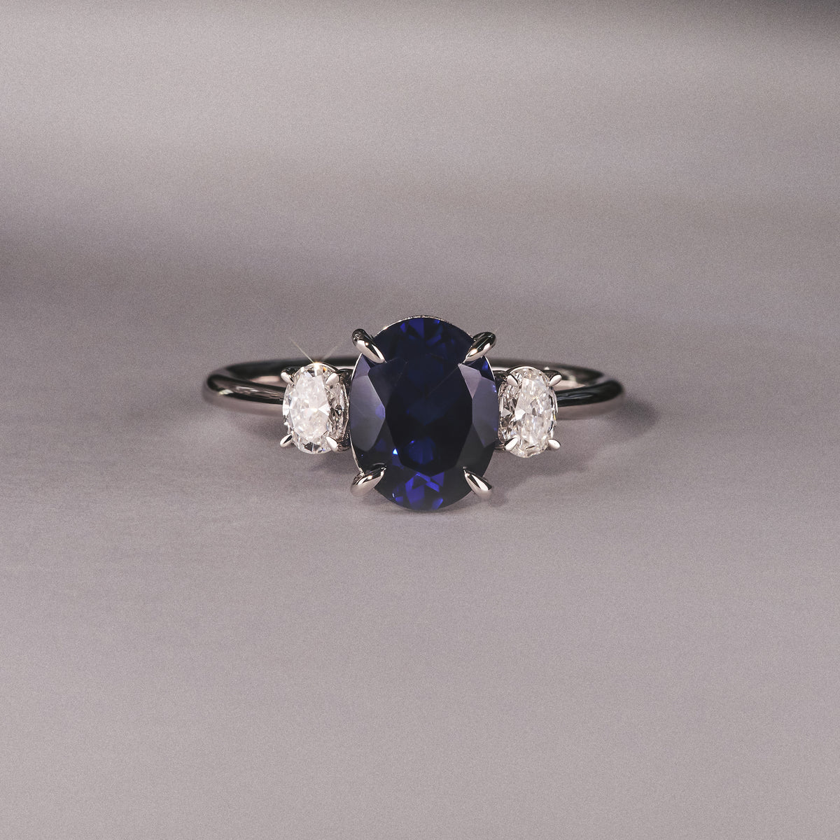 Solene 2.00ct Oval Cut Lab Sapphire and Lab Diamond 3 Stone Engament Ring in 18K White Gold
