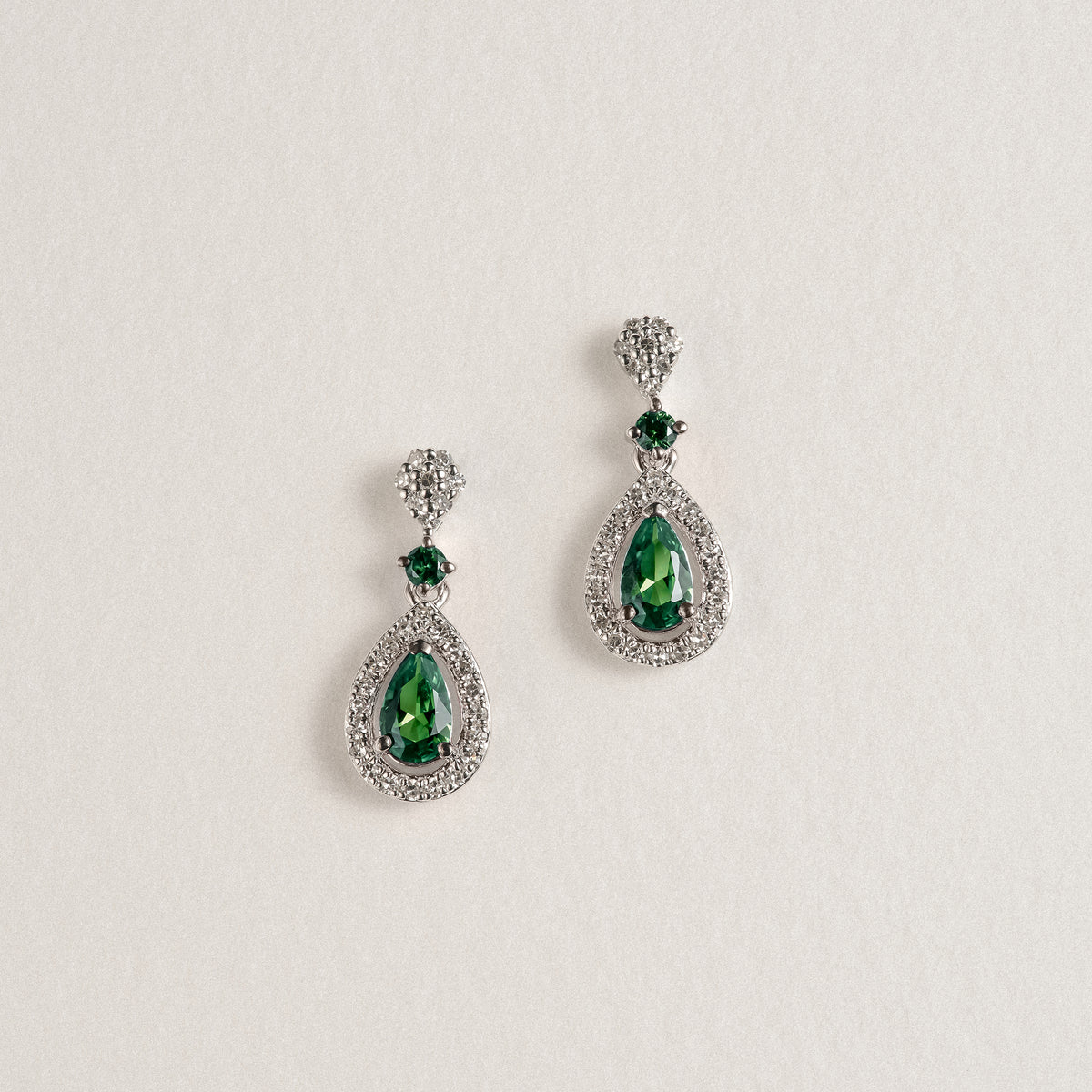 Stellato 0.35ct Pear Cut Lab Emerald Halo Drop Earrings in Sterling Silver