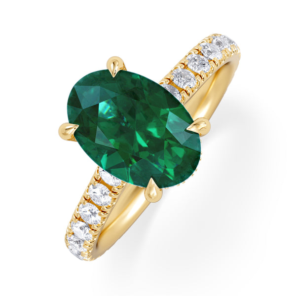Amora Gem 2.00ct Oval Cut Lab Emerald Hidden Halo Engagement Ring with Side Stones in 18K Yellow Gold
