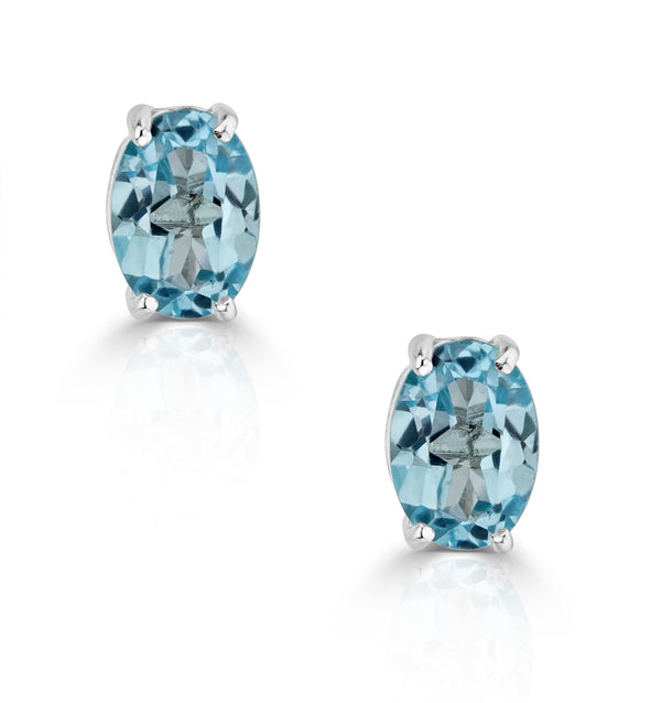 Blue Topaz 7 x 5mm and 9K White Gold Earrings