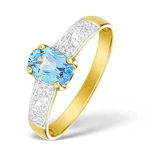 9K Gold Diamond and Blue Topaz Solitaire Style Ring - E4080