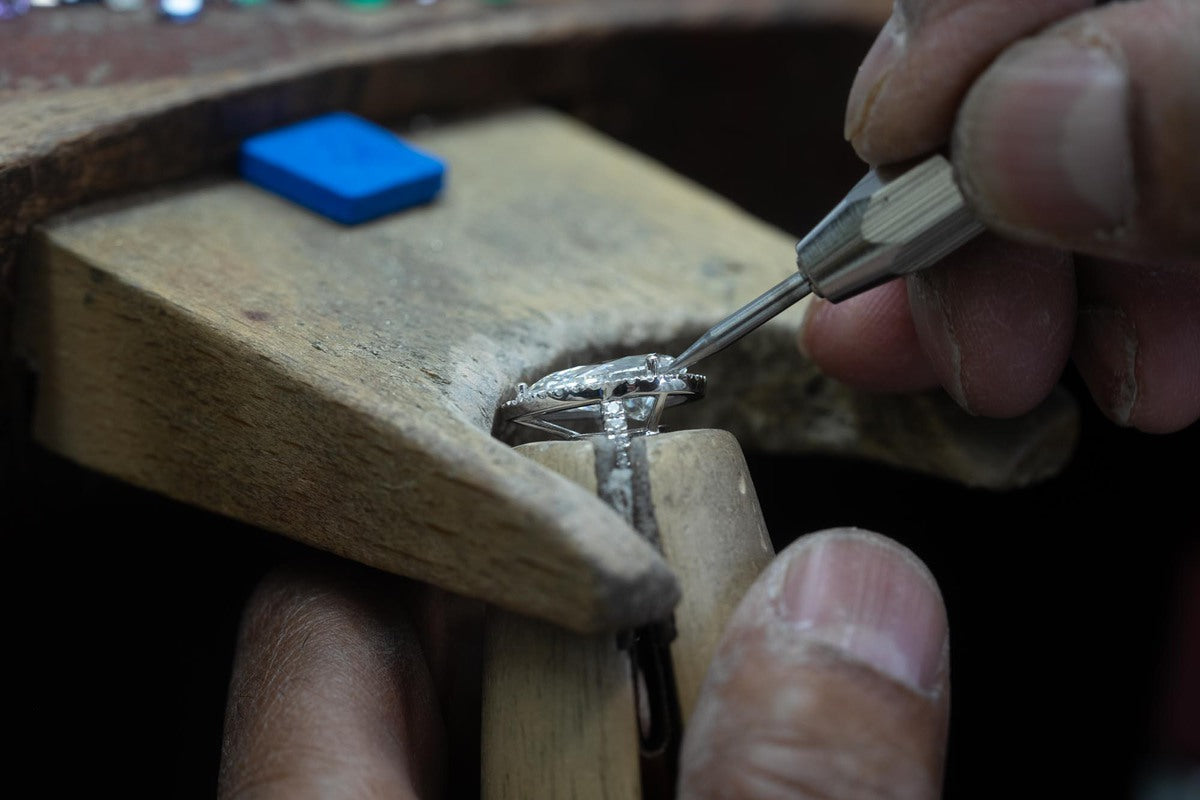 jeweller changing the sizes of jewellery