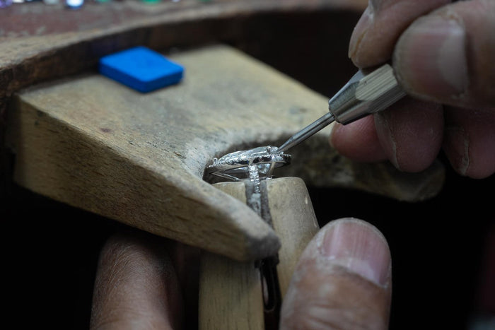 jeweller changing the sizes of jewellery
