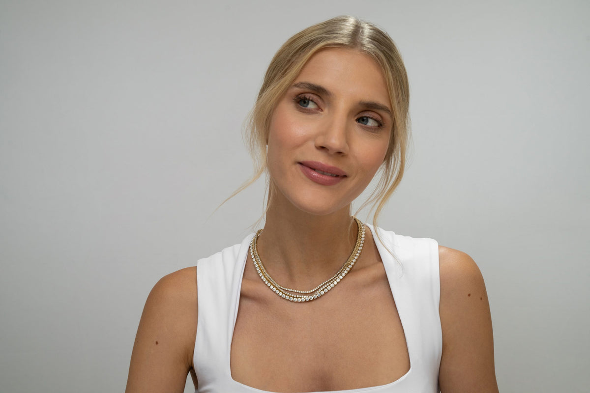 lady wearing diamond necklaces