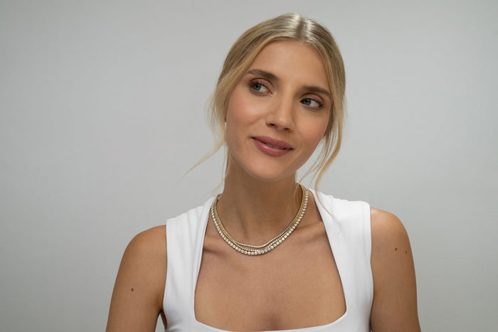 lady wearing diamond necklaces