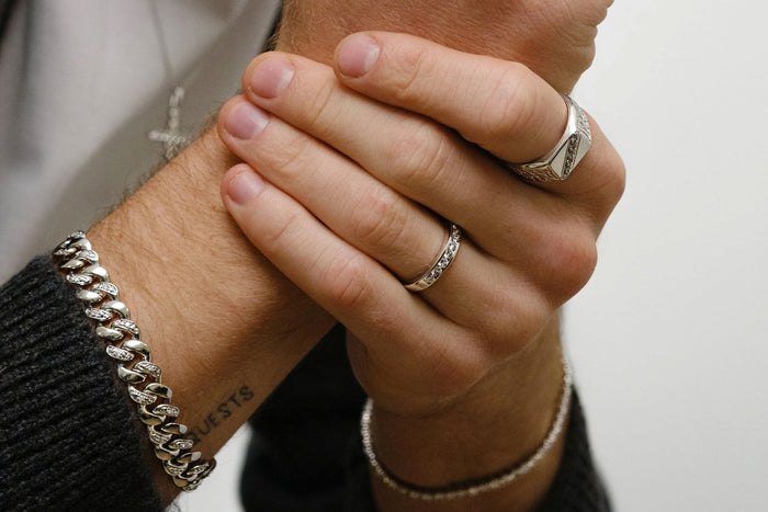 man wearing diamond jewellery