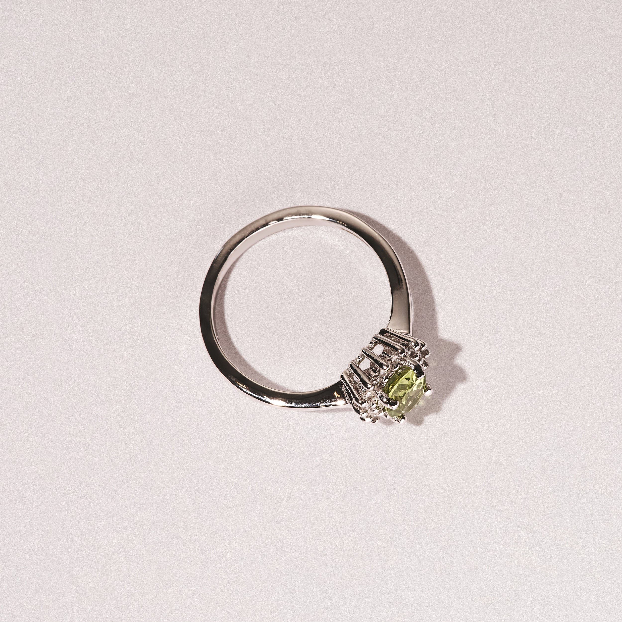 Peridot 7 x 5mm And Diamond 9K White Gold Ring