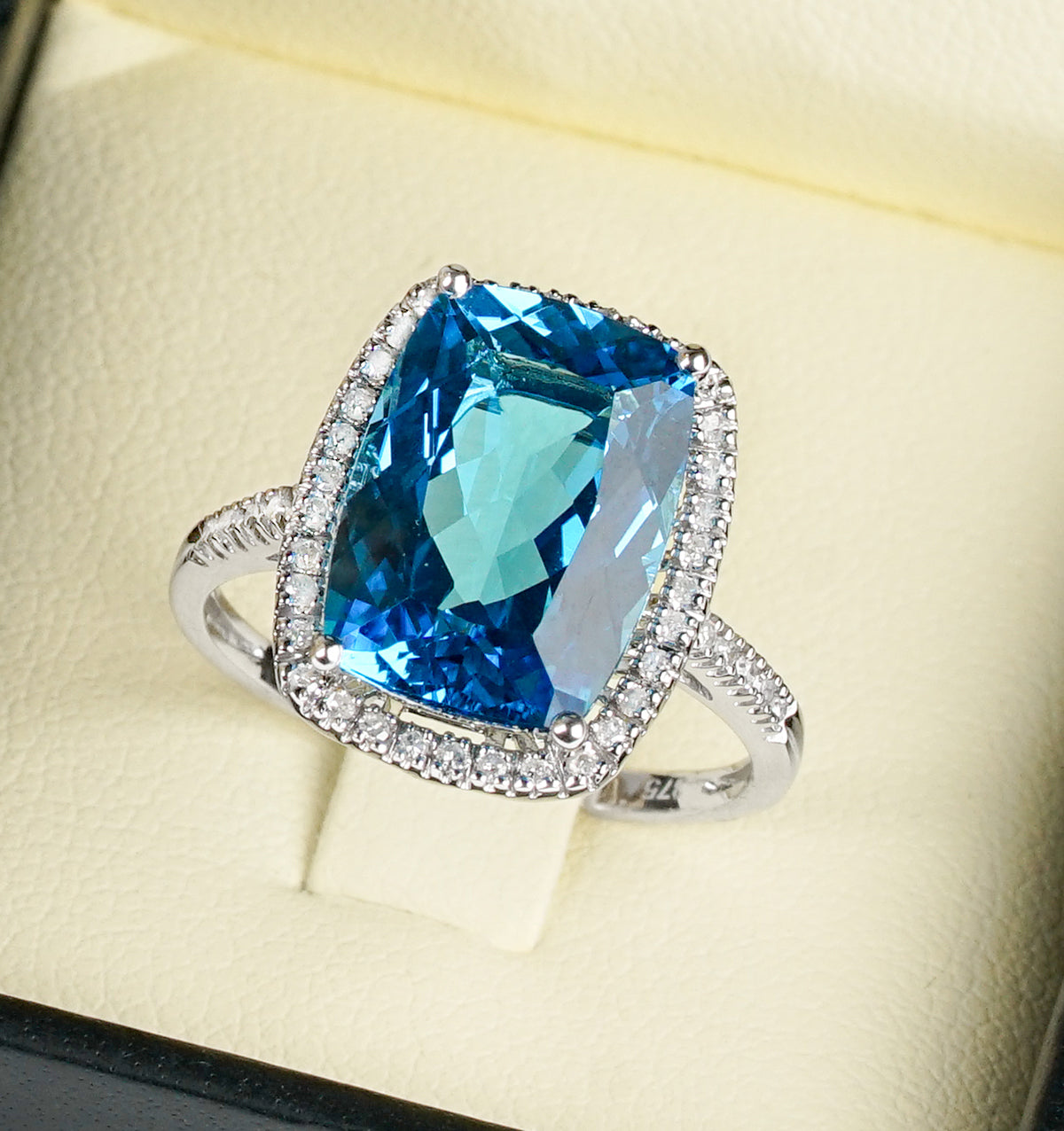 Blue Topaz 6.83CT And Diamond 9K White Gold Ring
