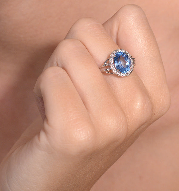 Blue Topaz 3.42ct And Diamond 9K White Gold Ring