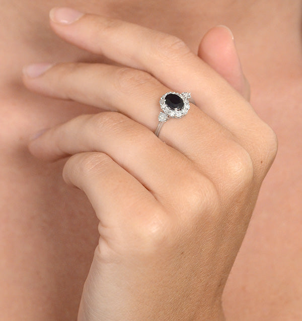 Sapphire 7 x 5mm and Diamond 9K White Gold Ring