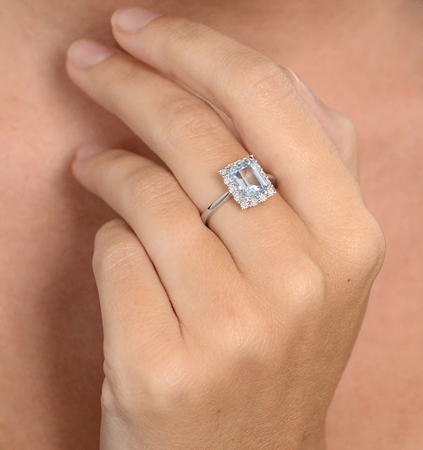 Blue Topaz 8 x 6mm and Diamond 9K White Gold Ring