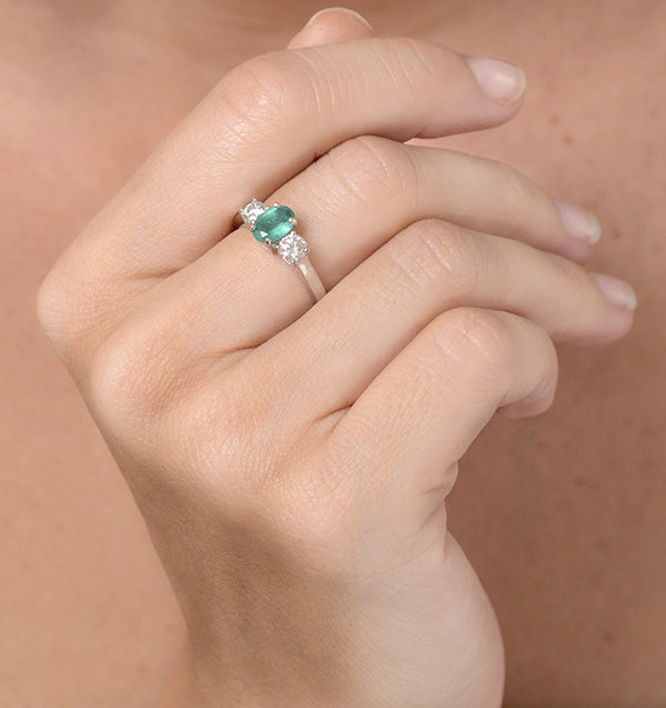 Emerald 0.70ct And Diamond 0.50ct Platinum Ring