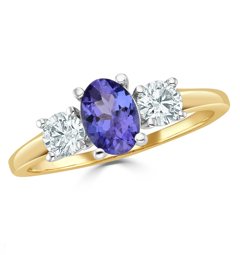 Tanzanite 7 x 5mm And Diamond 18K Gold Ring FET23-V
