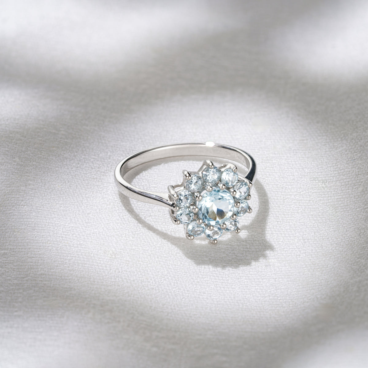 1.10ct Blue Topaz Cluster Ring in 9K White Gold