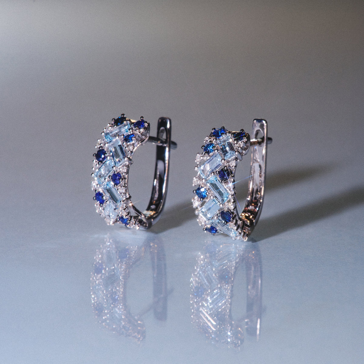Blue Topaz Sapphire and Diamond Stellato Earrings in 9K White Gold