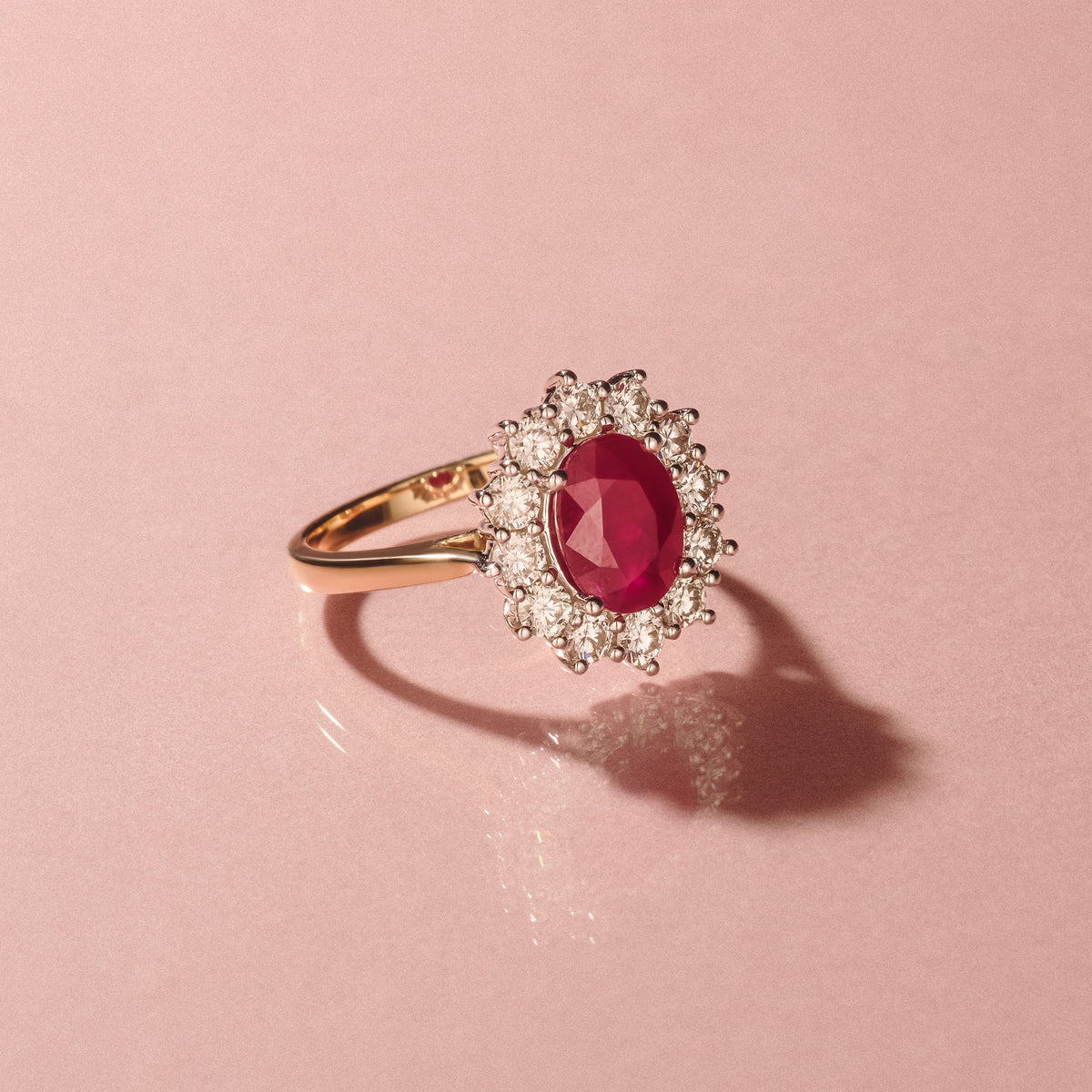 2.40ct Oval Cut Ruby and Lab Diamond Halo Ring in 9K Yellow Gold