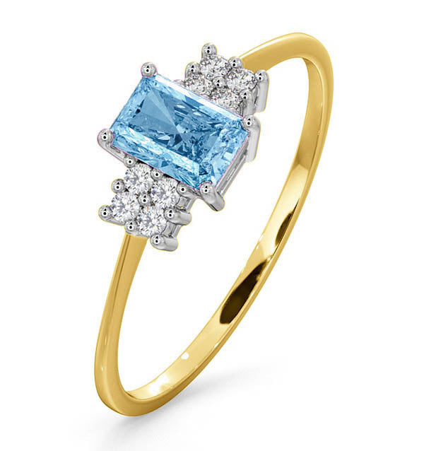 Blue Topaz 6 x 4mm And Diamond Ring 9K Yellow Gold