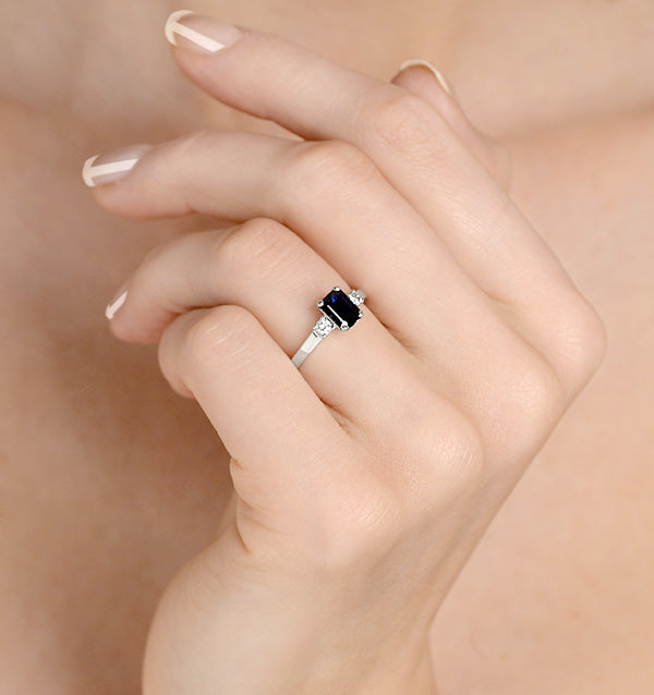 Sapphire 7 x 5mm And Diamond 18K White Gold Ring