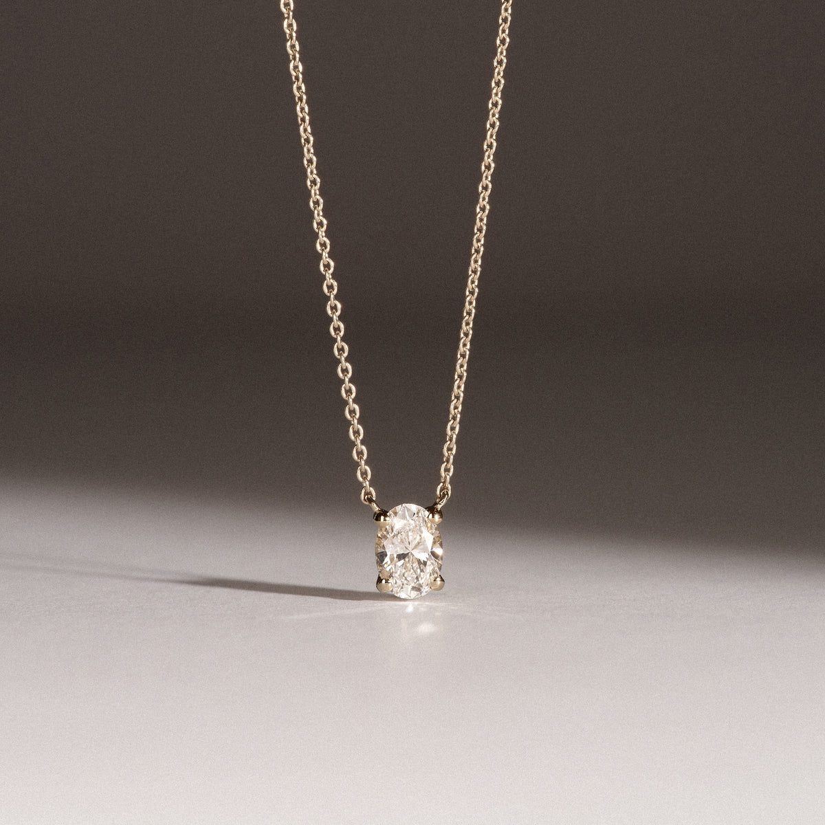 Wanderlust Floating Oval Cut Lab Diamond Solitaire Necklace 0.50ct H/SI in 9K Gold