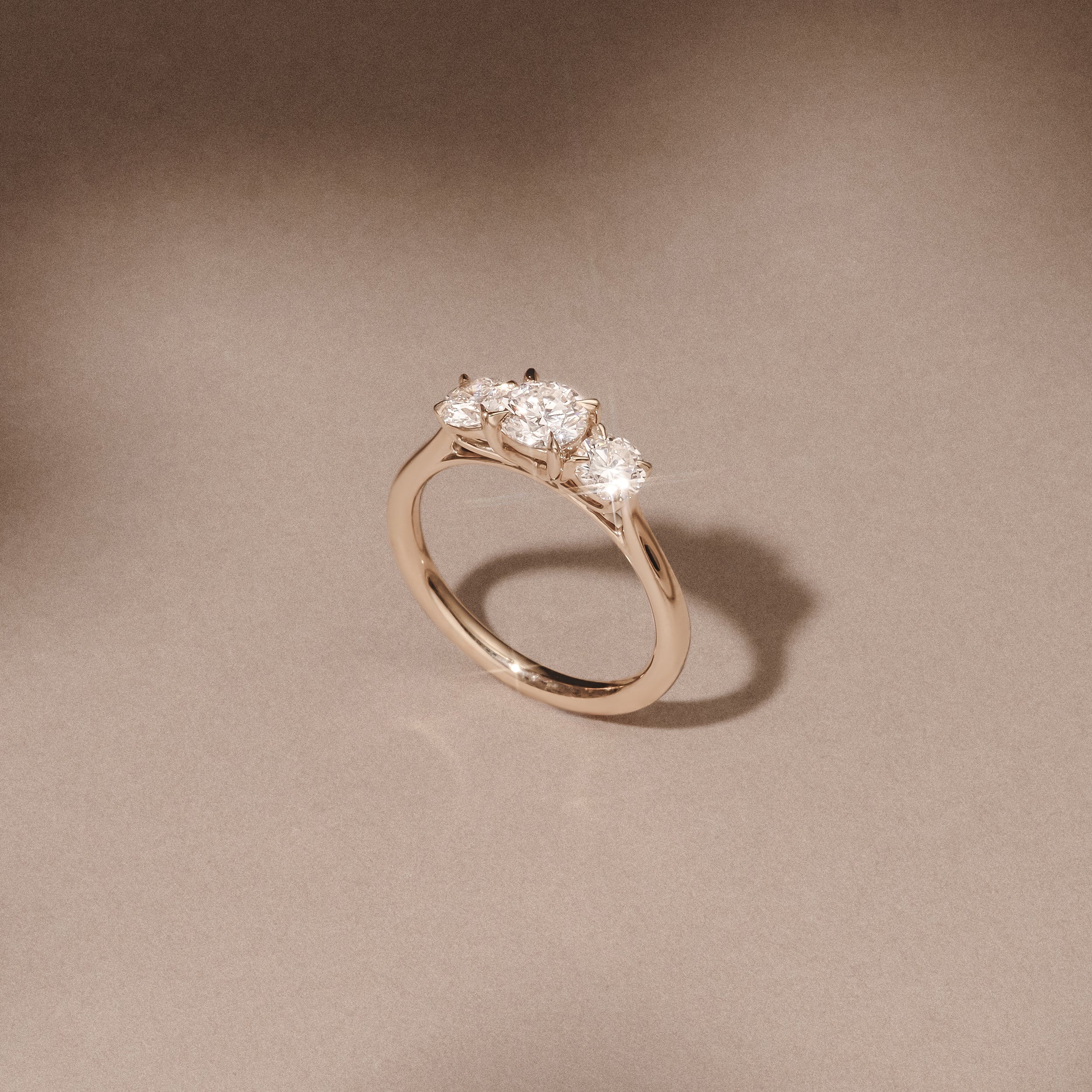 Evoke 1.00ct Round Cut Lab Diamond 3 Stone Ring in 9K Yellow Gold