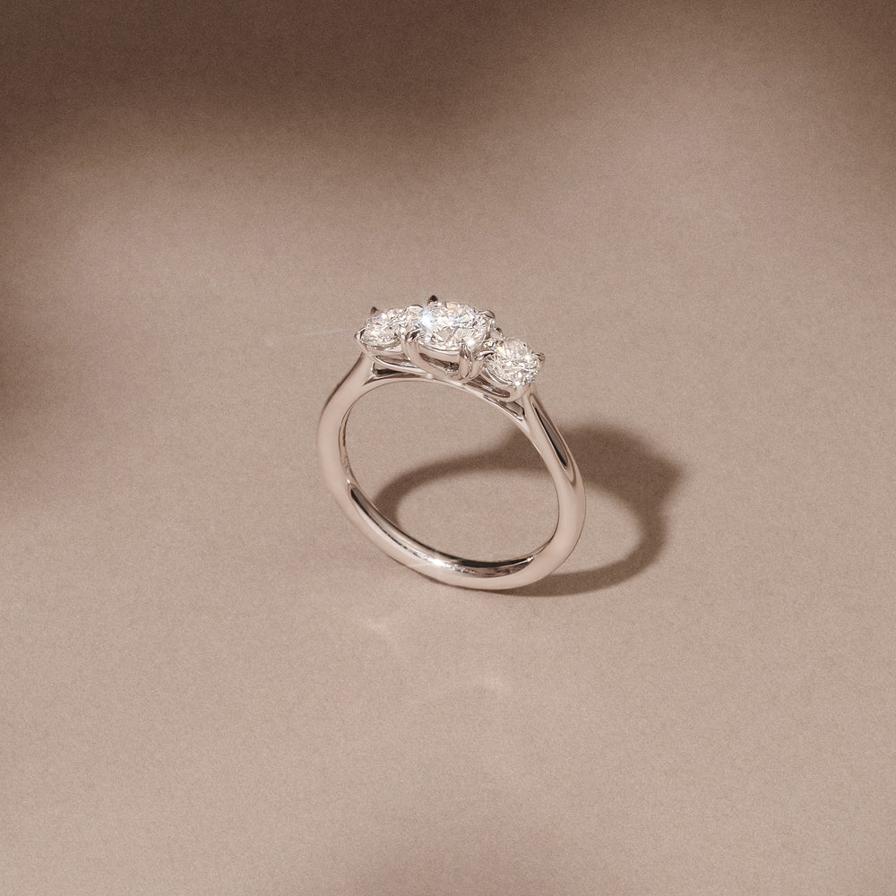 Evoke 1.00ct Round Cut Lab Diamond 3 Stone Ring in 9K White Gold
