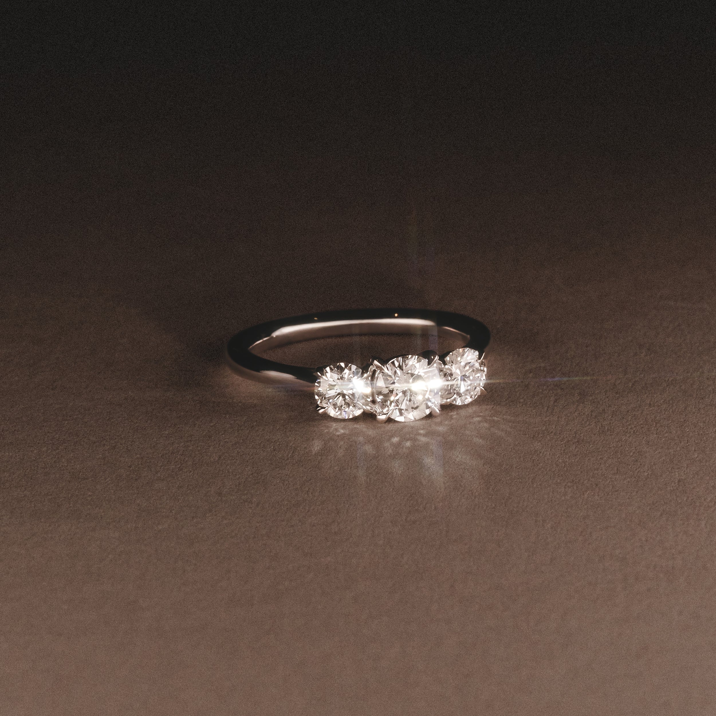 Evoke 1.00ct Round Cut Lab Diamond 3 Stone Ring in 9K White Gold