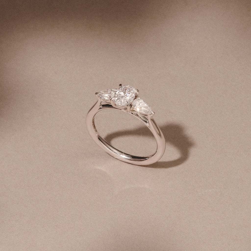 Evoke 1.00ct Oval Cut Lab Diamond 3 Stone Ring in 9K White Gold