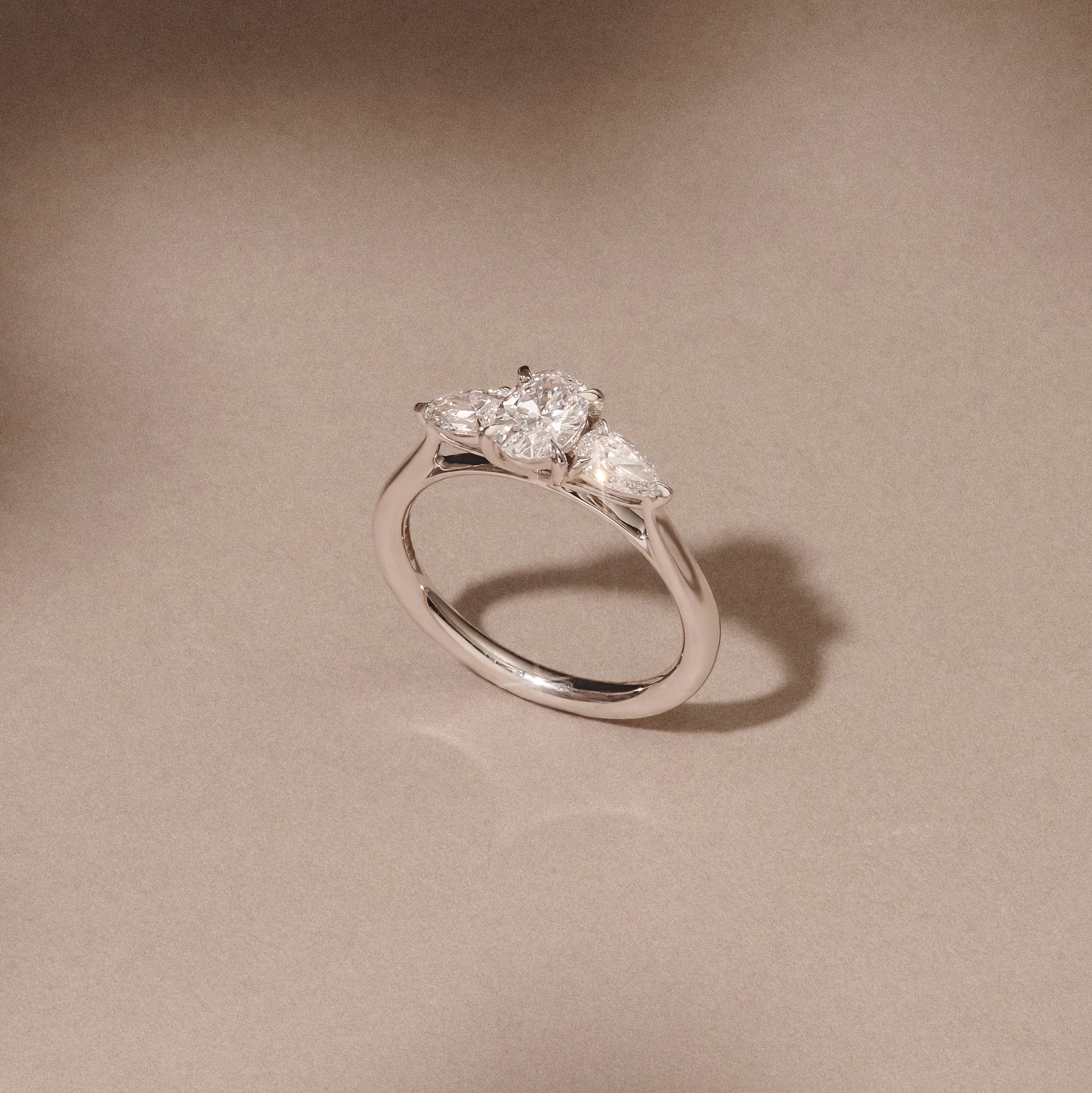 Evoke 1.00ct Oval Cut Lab Diamond 3 Stone Ring in 9K White Gold