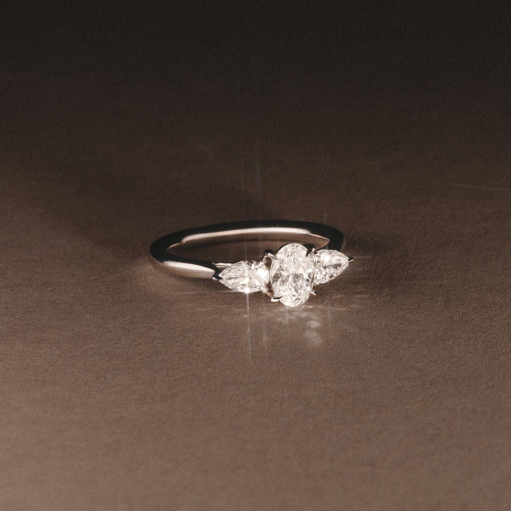 Evoke 1.00ct Oval Cut Lab Diamond 3 Stone Ring in 9K White Gold