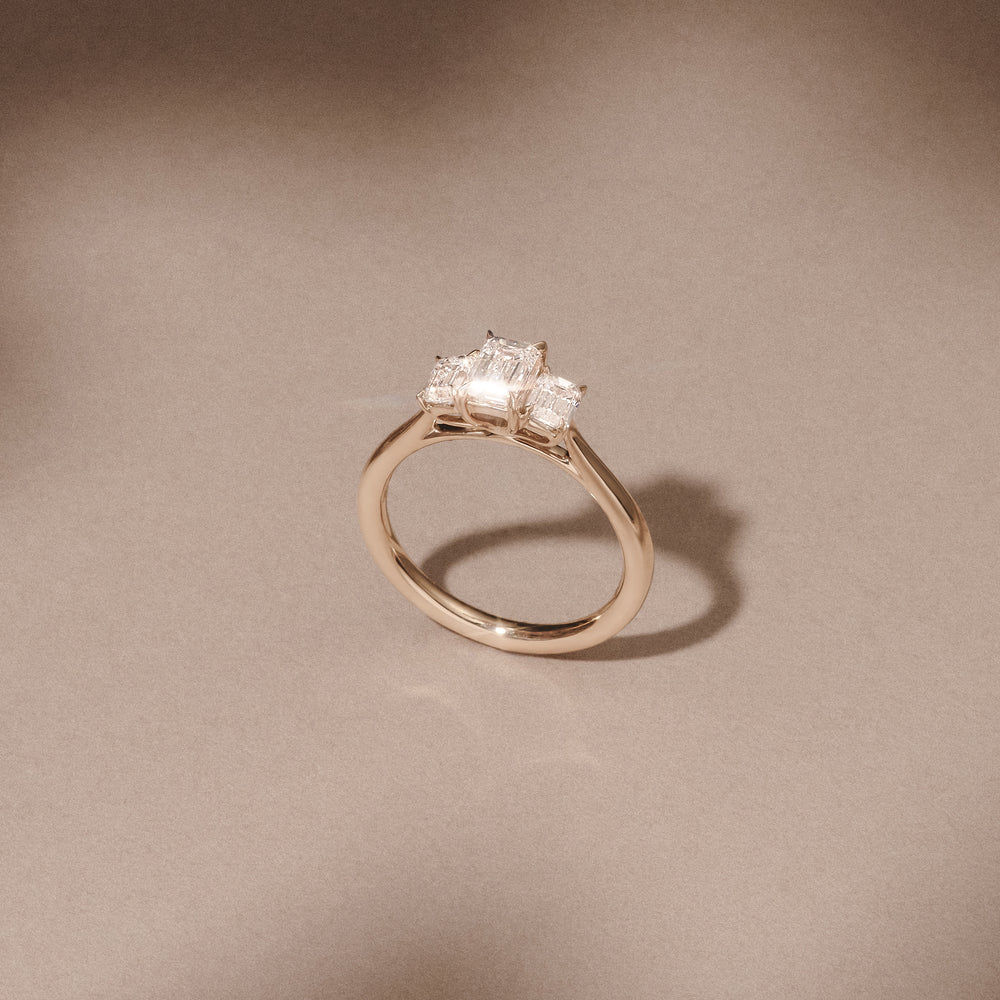Evoke 1.00ct Emerald Cut Lab Diamond 3 Stone Ring in 9K Yellow Gold