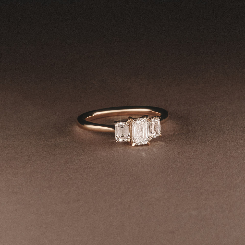 Evoke 1.00ct Emerald Cut Lab Diamond 3 Stone Ring in 9K Yellow Gold