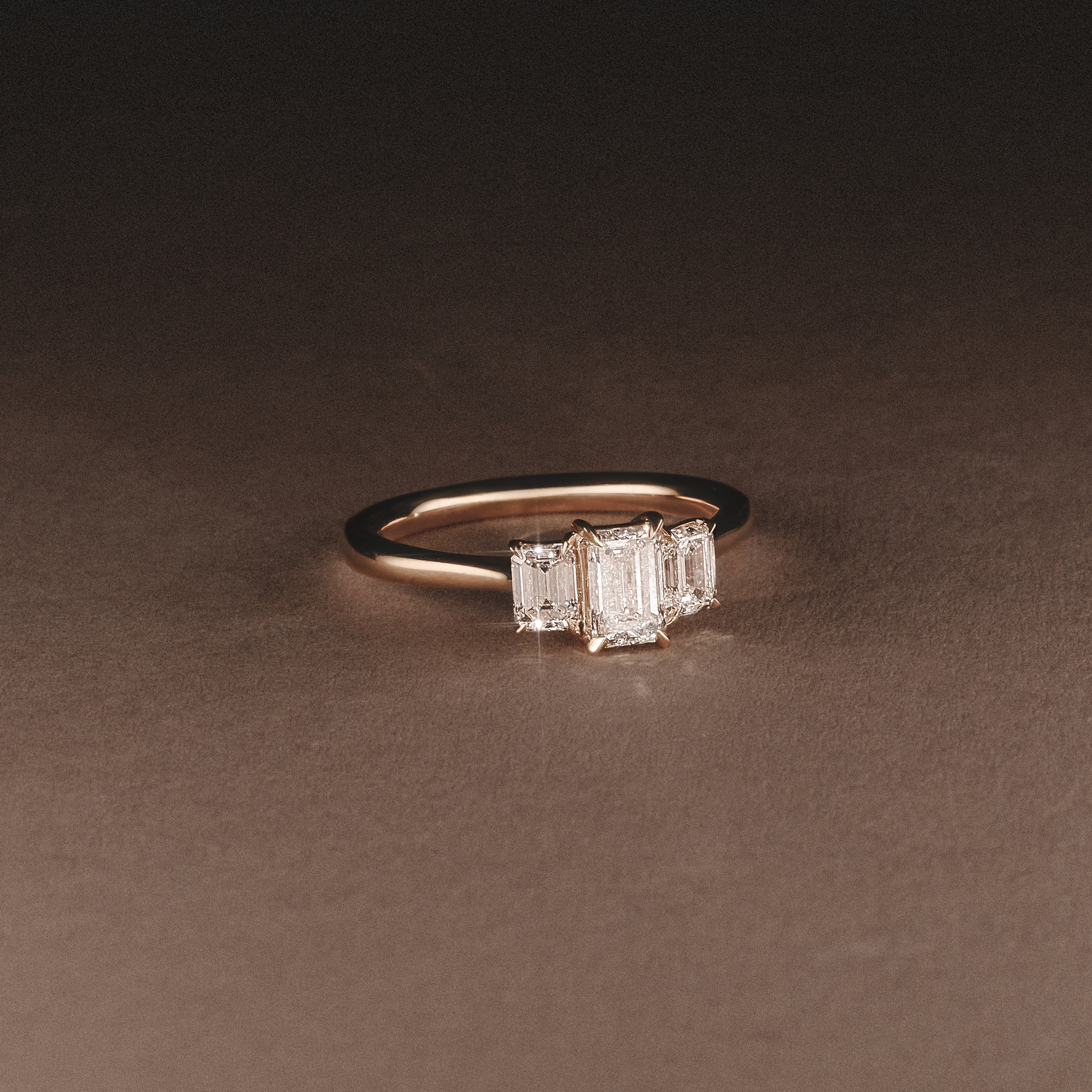 Evoke 1.00ct Emerald Cut Lab Diamond 3 Stone Ring in 9K Yellow Gold