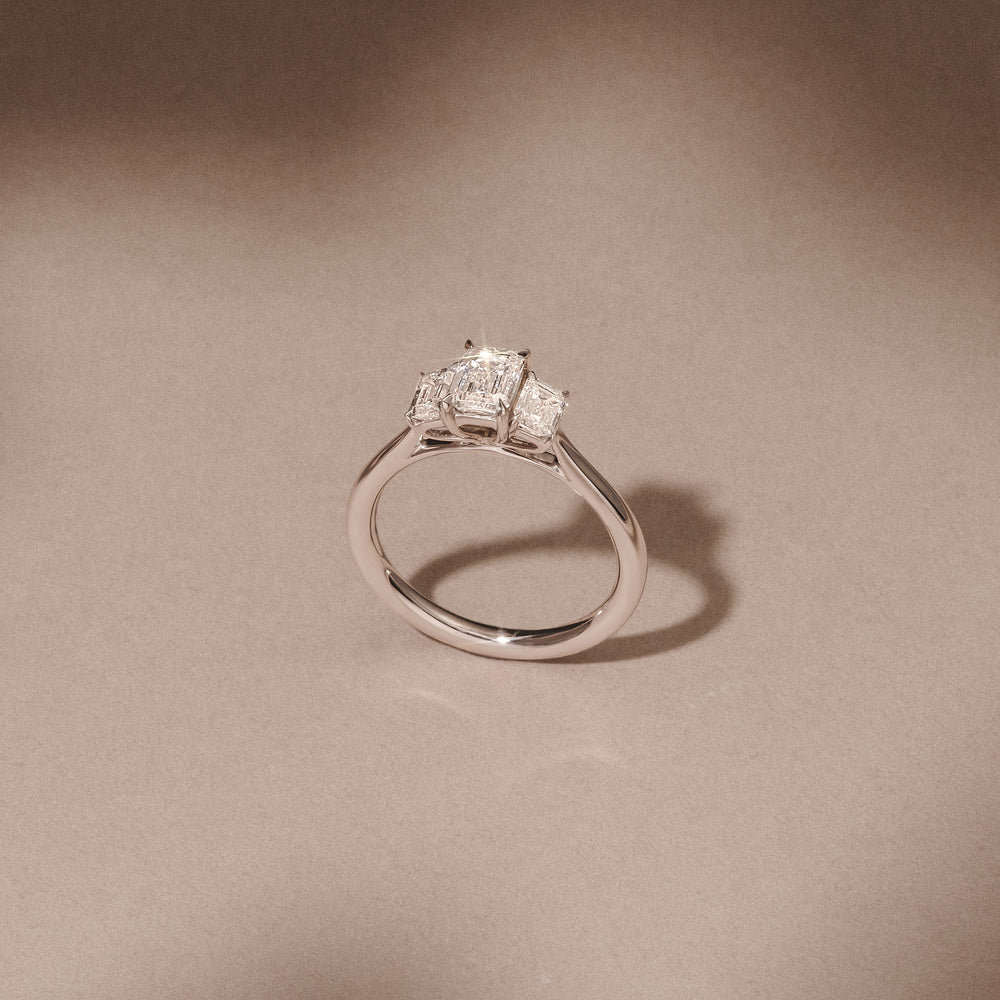 Evoke 1.00ct Emerald Cut Lab Diamond 3 Stone Ring in 9K White Gold