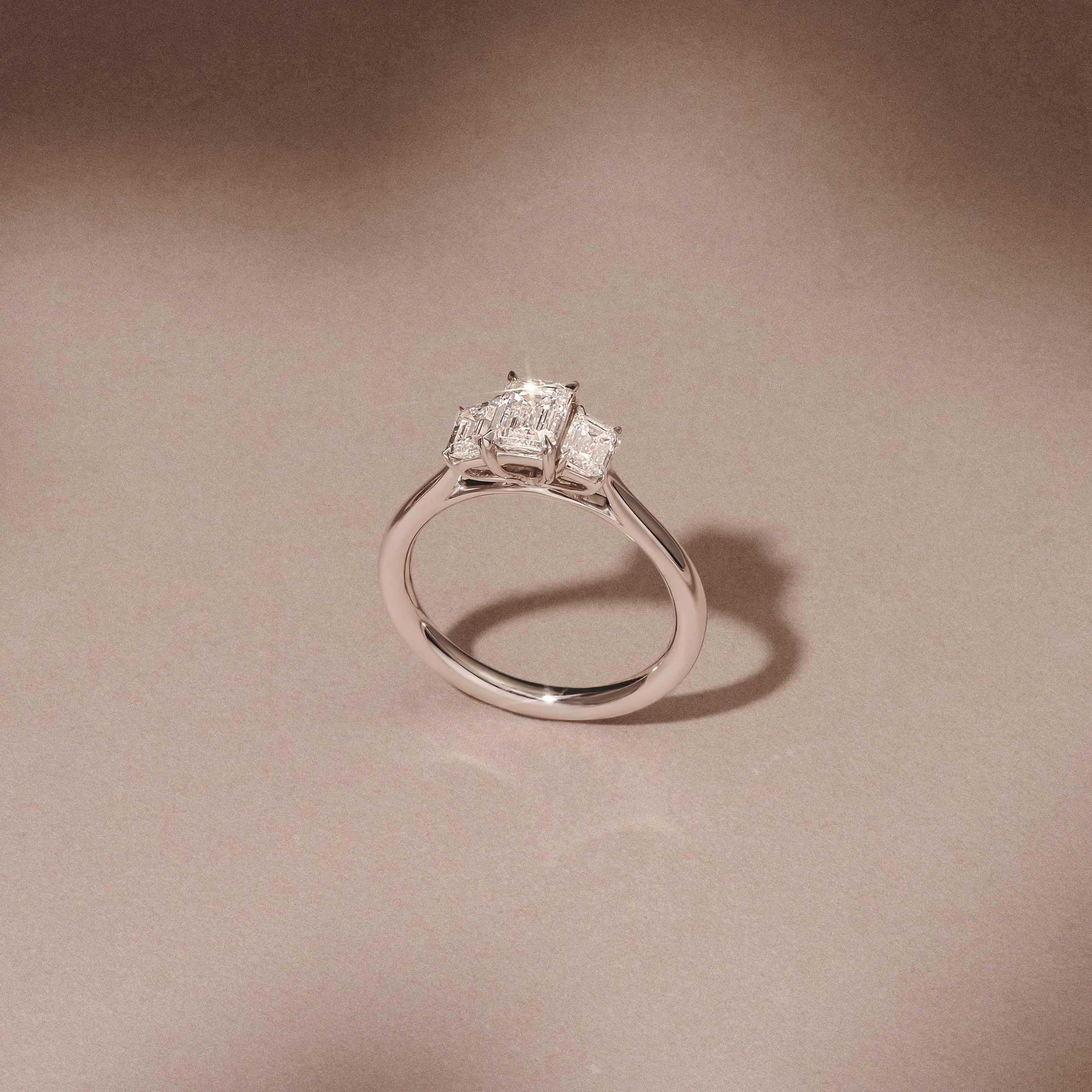 Evoke 1.00ct Emerald Cut Lab Diamond 3 Stone Ring in 9K White Gold