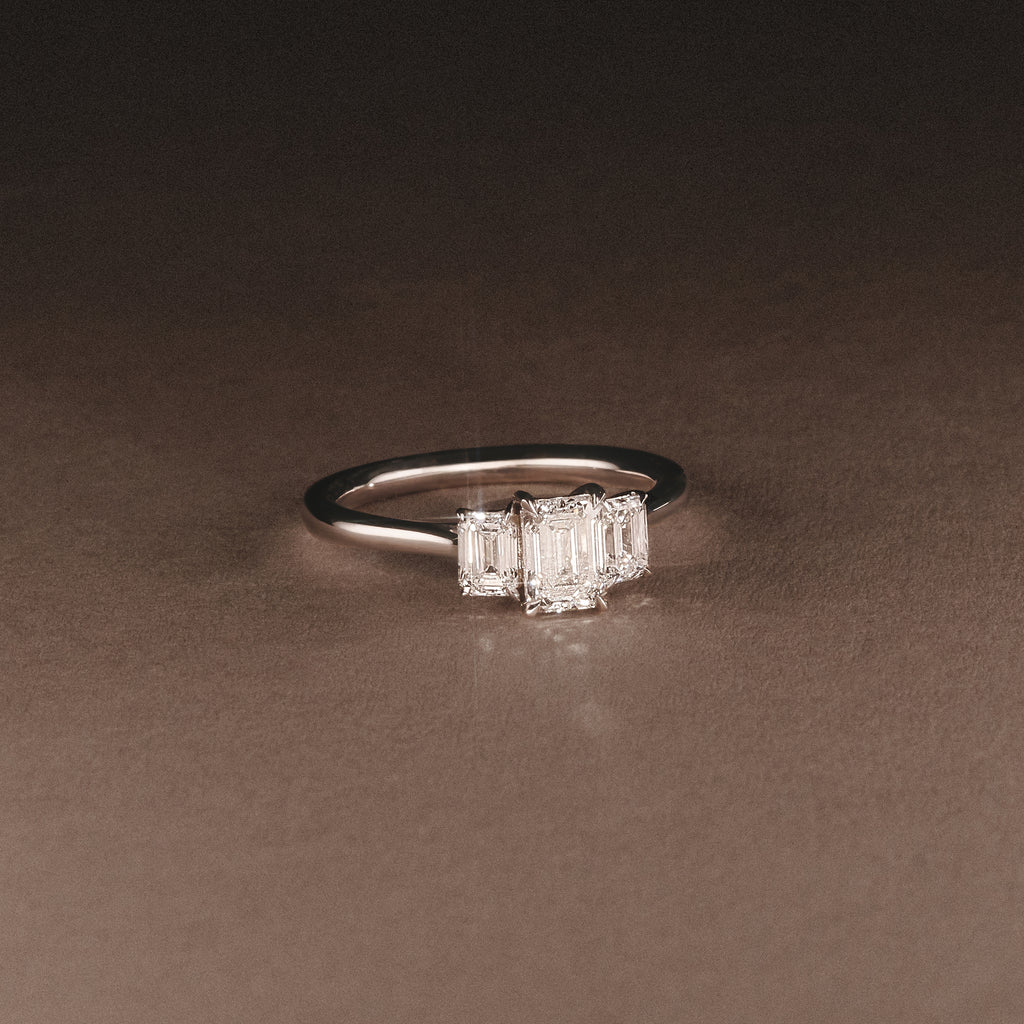 Evoke 1.00ct Emerald Cut Lab Diamond 3 Stone Ring in 9K White Gold