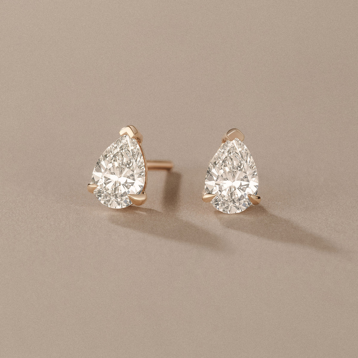 1.00ct Pear Cut Lab Diamond Stud Earrings in 18K Yellow Gold