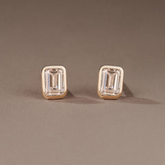 Skyline Bezel Set 1.00ct Emerald Cut Lab Diamond Stud Earrings in 18K Yellow Gold