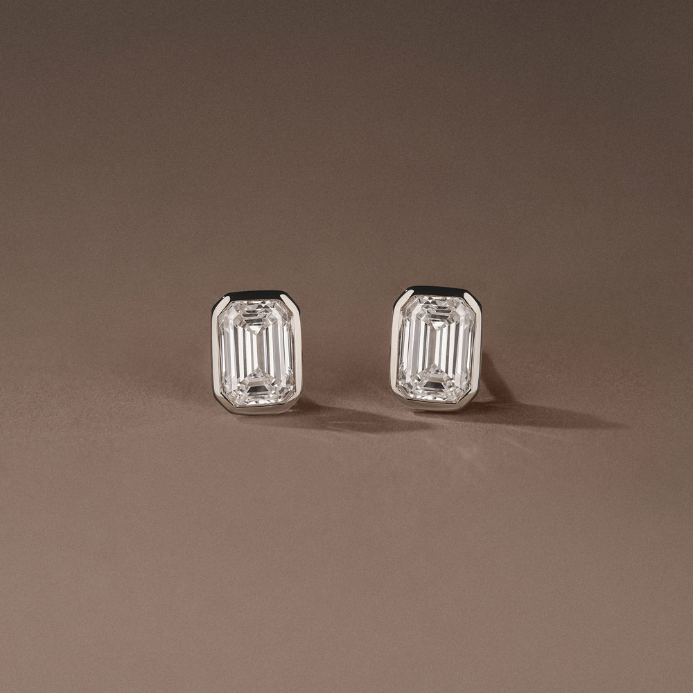 Bezel Set 2.00ct Emerald Cut Lab Diamond Stud Earrings in Platinum