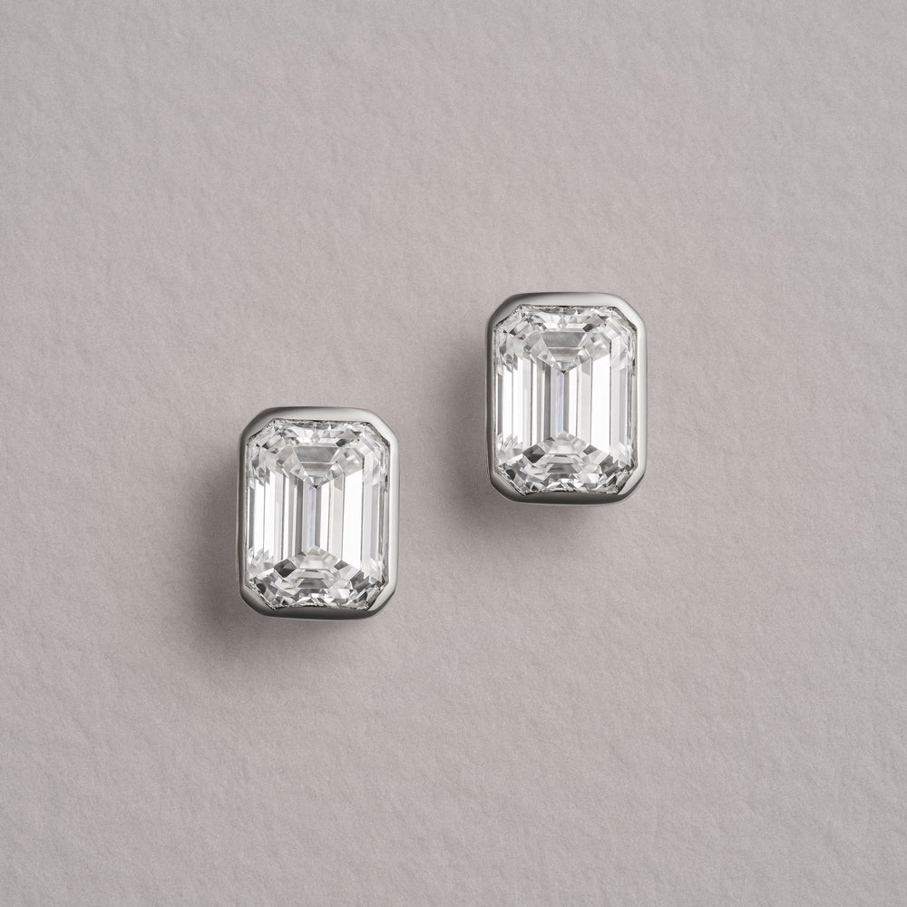 Bezel Set 3.00ct Emerald Cut Lab Diamond Stud Earrings in Platinum